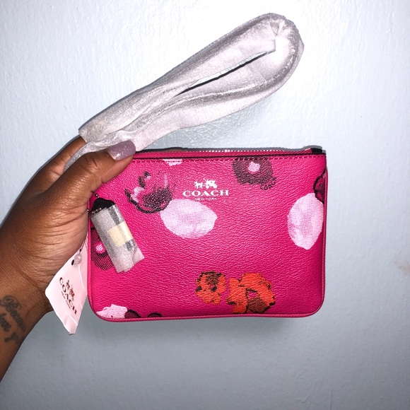 Coach Handbags - Coach floral small wristlet